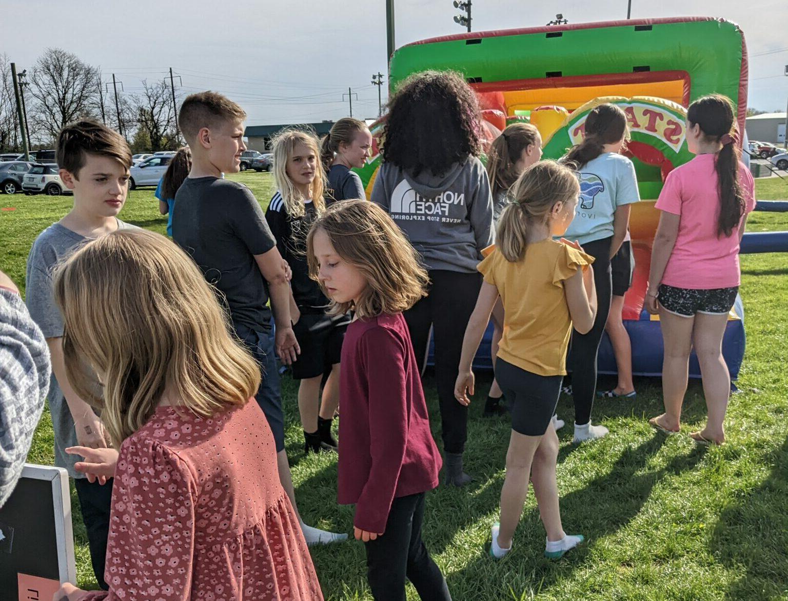 kids in line for bounce house
